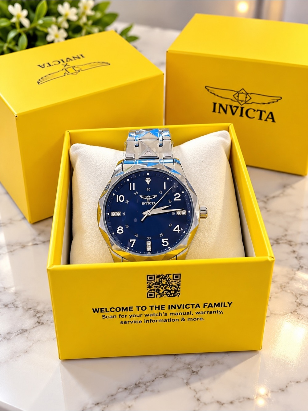 Invicta Men's Silver Watch with Blue Dial and Faceted Bezel